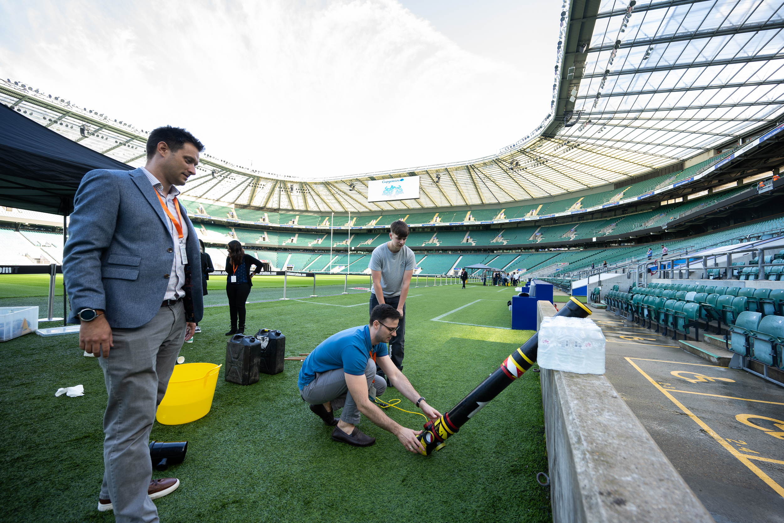 A group of people in a Rugby Stadium