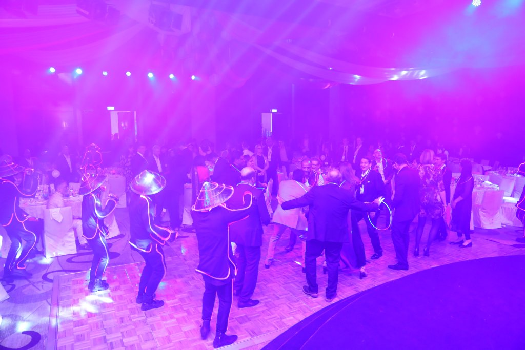 A group of people dancing.