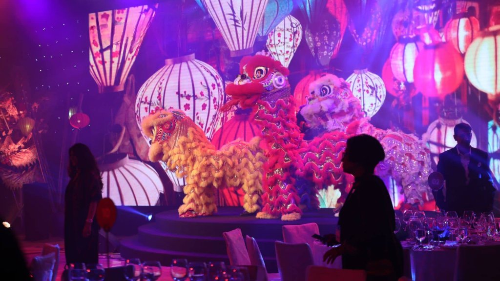 A group of people standing on a stage.