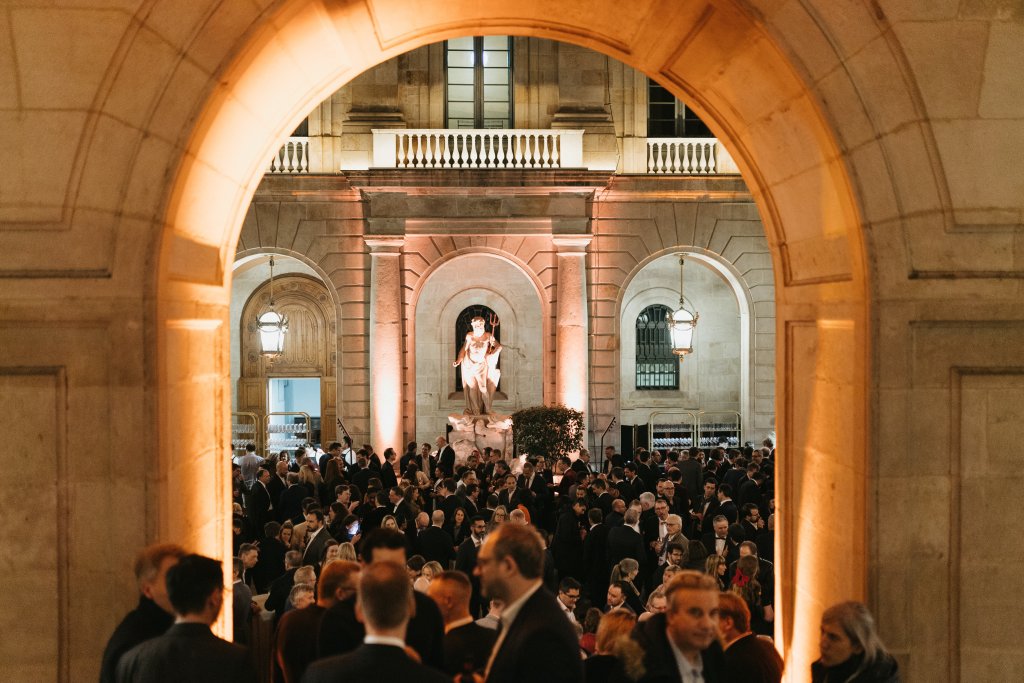 A group of people in a building.